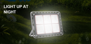 400W IP66 solar LED flood light providing bright outdoor security lighting at night in a garden setting.